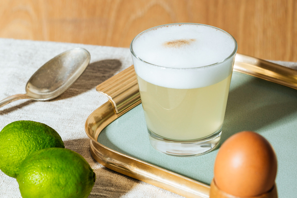 Cocktail with a lime wedge