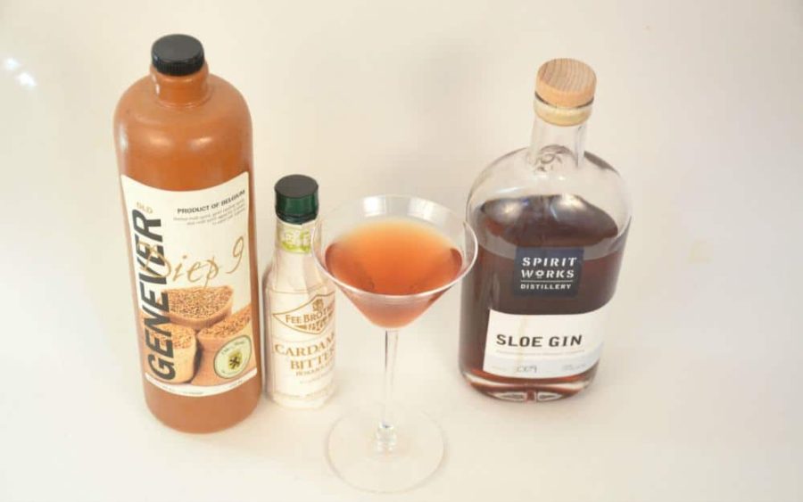Oude and Sloe cocktail with sloe gin, genever, and bitters, in a Martini Glass