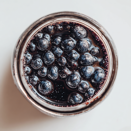 blueberries in a jar for making a syrup