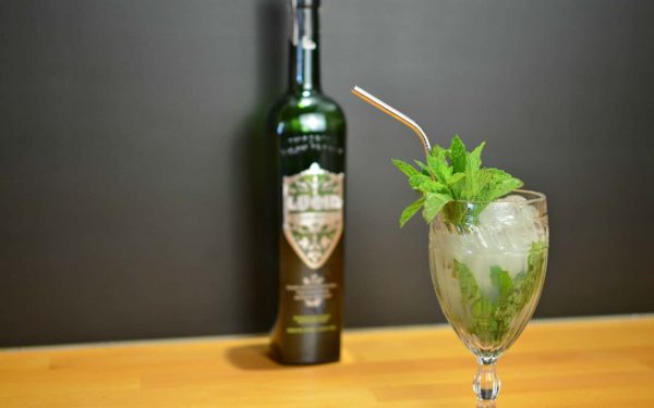 Absinthe Frappe cocktail with fresh mint sprigs and crushed ice