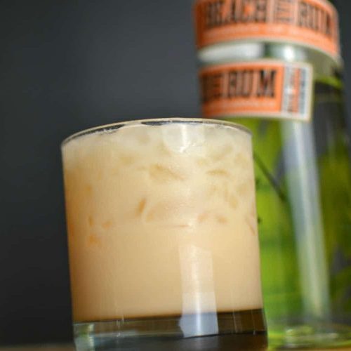 Tan cocktail in a rocks glass