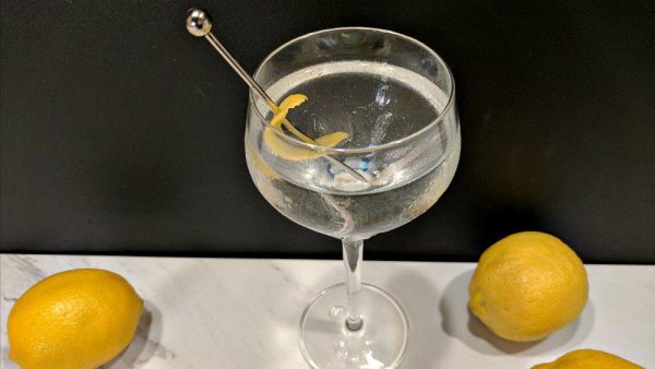 Vodka martini with a lemon peel