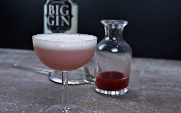 Clover Club with raspberry syrup and a bottle of Big Gin (brand)