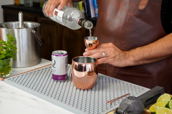 Moscow mule Moscow Mule original recipe being poured with Kettle One vodka