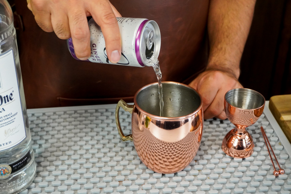 fresh ginger beer and leftover lime lime wedge makes this an acidic drink