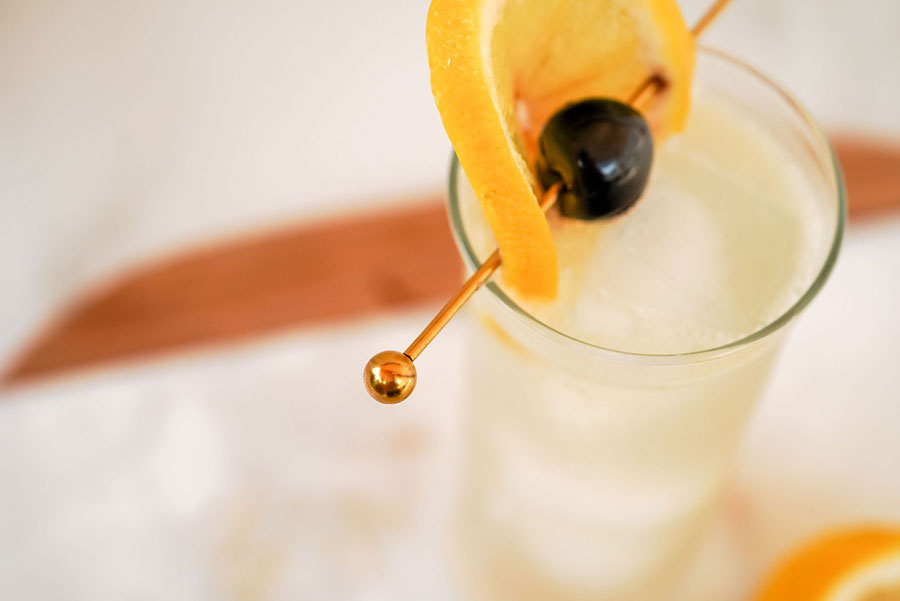Gold cocktail pick, copyright A Bar Above