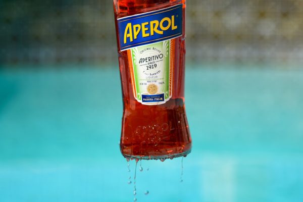 Aperol bottle for classic cocktail by yesmore content via unsplash