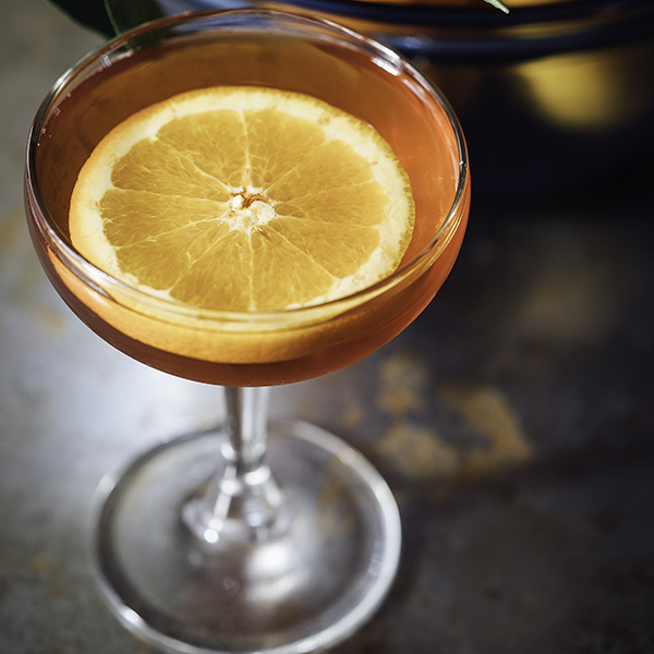 sidecar cocktail in a prepared glass using orange-flavored liqueur by adam jaime via unsplash copy