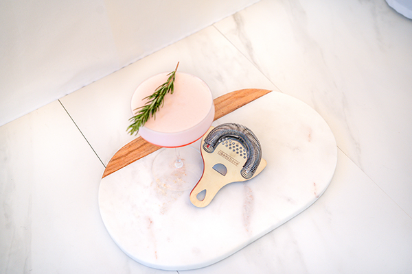 Stainless steel Hawthorne strainer with holiday cocktail