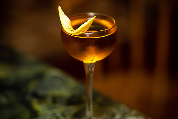 Dubliner with a lemon twist in a cocktail glass by chas turansky via unsplash