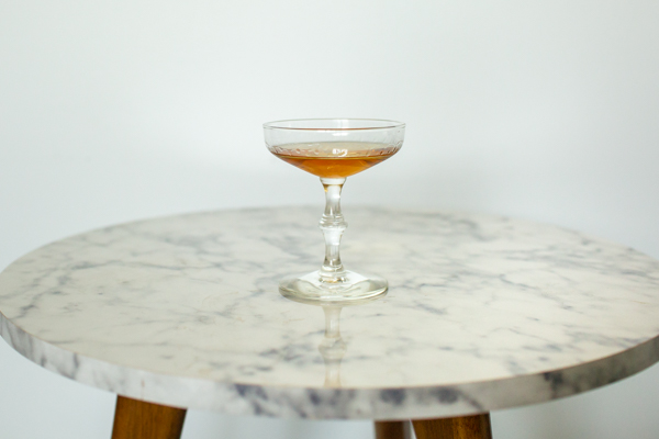Glass of Grand Marnier aged spirit with bold flavors in a cocktail glass