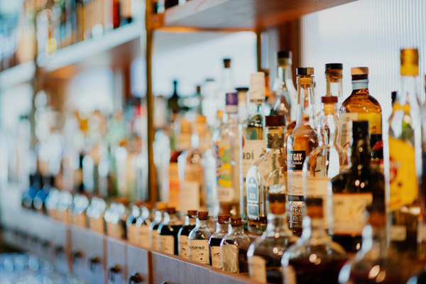 bottles of liquor for casual cocktail lovers via unsplash