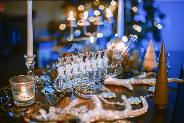 lighting the menorah on a table