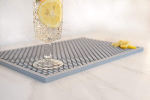 gray bar mat with cocktail
