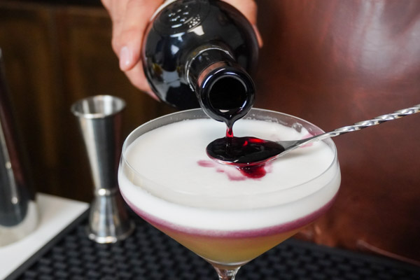 transforming the Whiskey Sour into different sour recipes with egg whites and red wine, over 2 ounces Bourbon whiskey