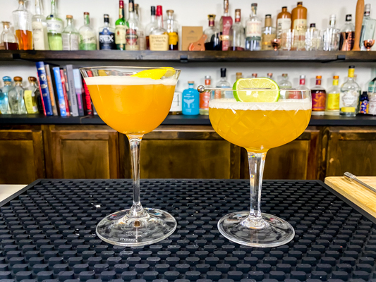 1. two flavored martinis in chilled glass with 1 ounces pineapple juice each