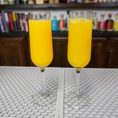 2 mimosa fizzy champagne cocktails make with our favorite champagne, a brunch classic that is also good for dinner parties