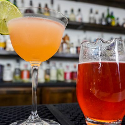 Strawberry Daiquiri with lime slice and fresh strawberry juice