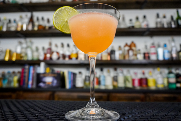 favorite strawberry cocktails of daiquiri classic drink with in a chilled glass with with a lime wedge in a nick & nora glass with a classic shape perfect for straight-up cocktails