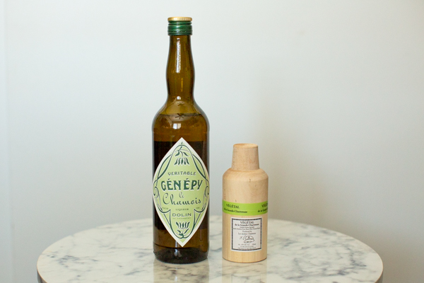 2 bottles of liqueur with flavor components comparable to Chartreuse