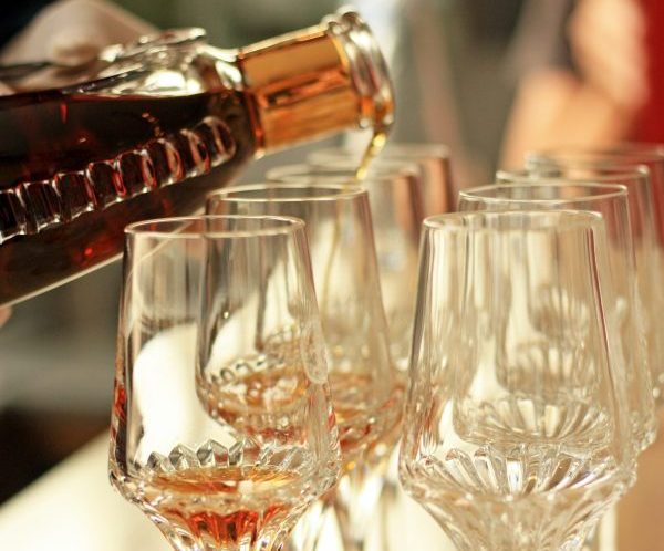 12. pouring brandy from white wine grapes