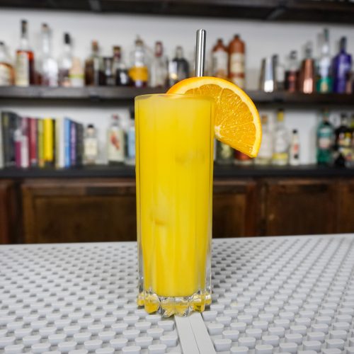 Screwdriver with orange wedge