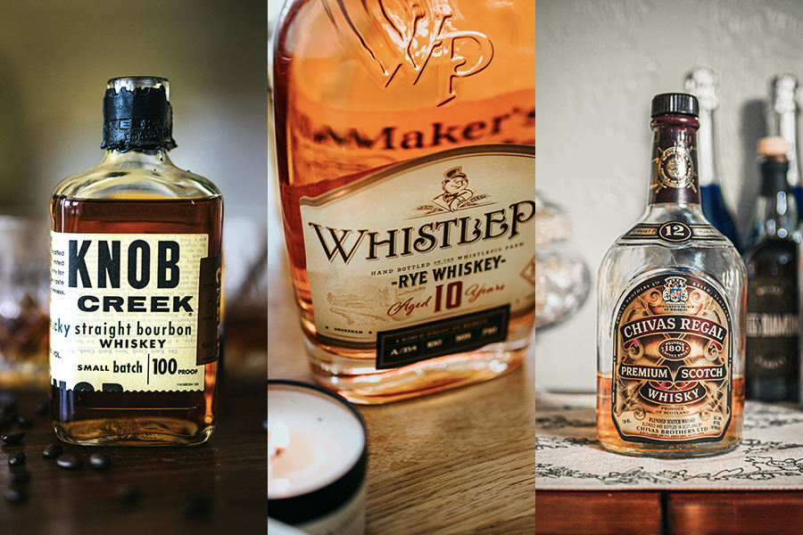 A Composite of 3 bottles of whiskey: (from left) bourbon, rye, and Scotch