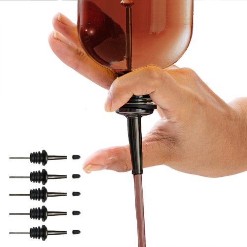 a bottle with a stylish kitchen gadget pour spout, turned upside down and pouring out liquid